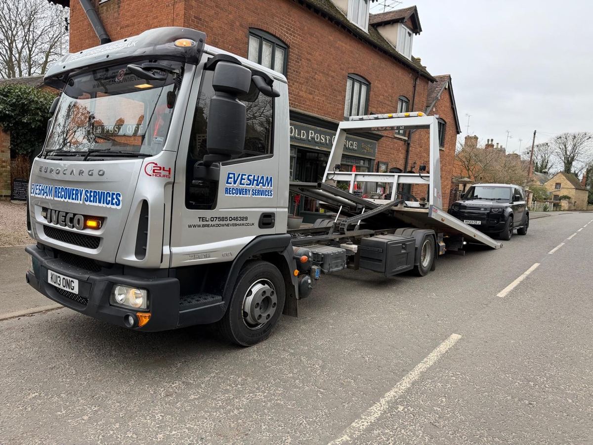 Collecting a 4x4 outside the Old Post Office in a Cotswold village